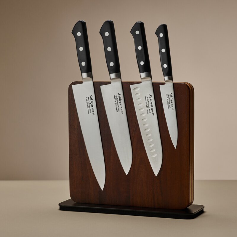 Master santokukniv med luftlommer 18 cm svart