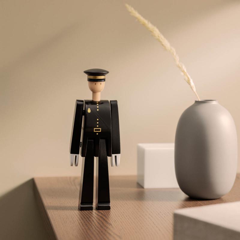 Politimann svart